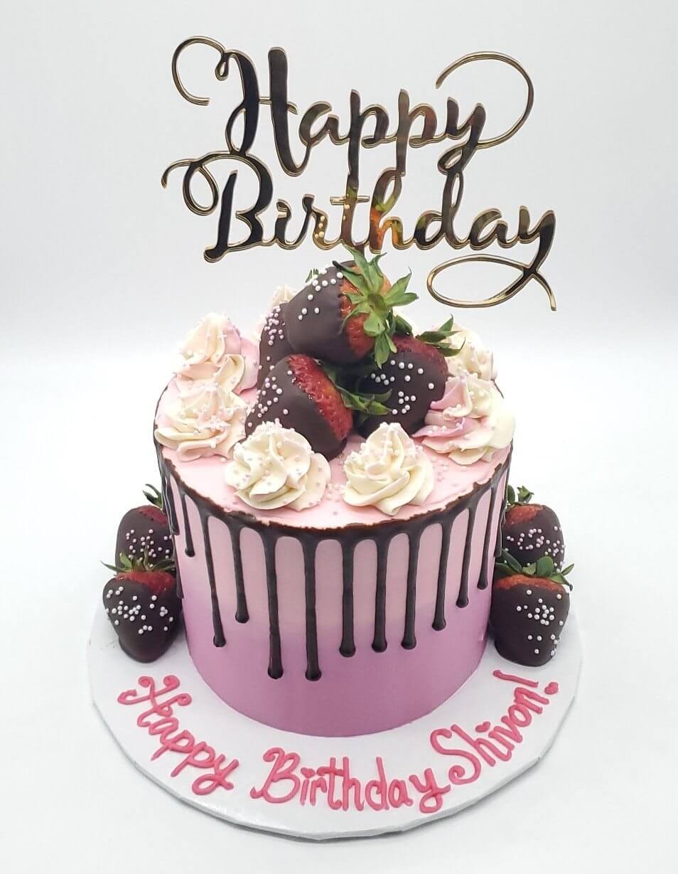 happy birthday cake topper on top of birthday cake in Phoenix.