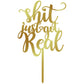 gold wedding cake topper that says shit just got real