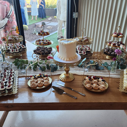 vintage heart shaped wedding cake and dessert bar in Phoenix.