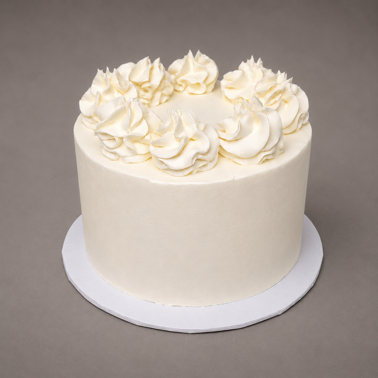 whipped cream cake with dollops silver rose bakery