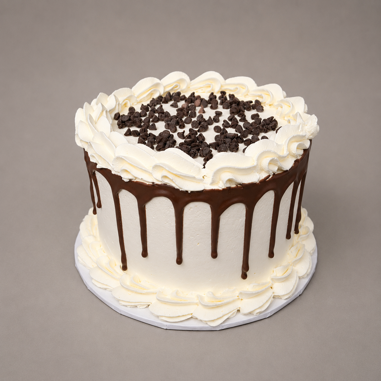 chocolate drip whipped cream cake silver rose bakery