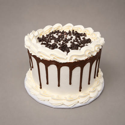 chocolate drip whipped cream cake silver rose bakery