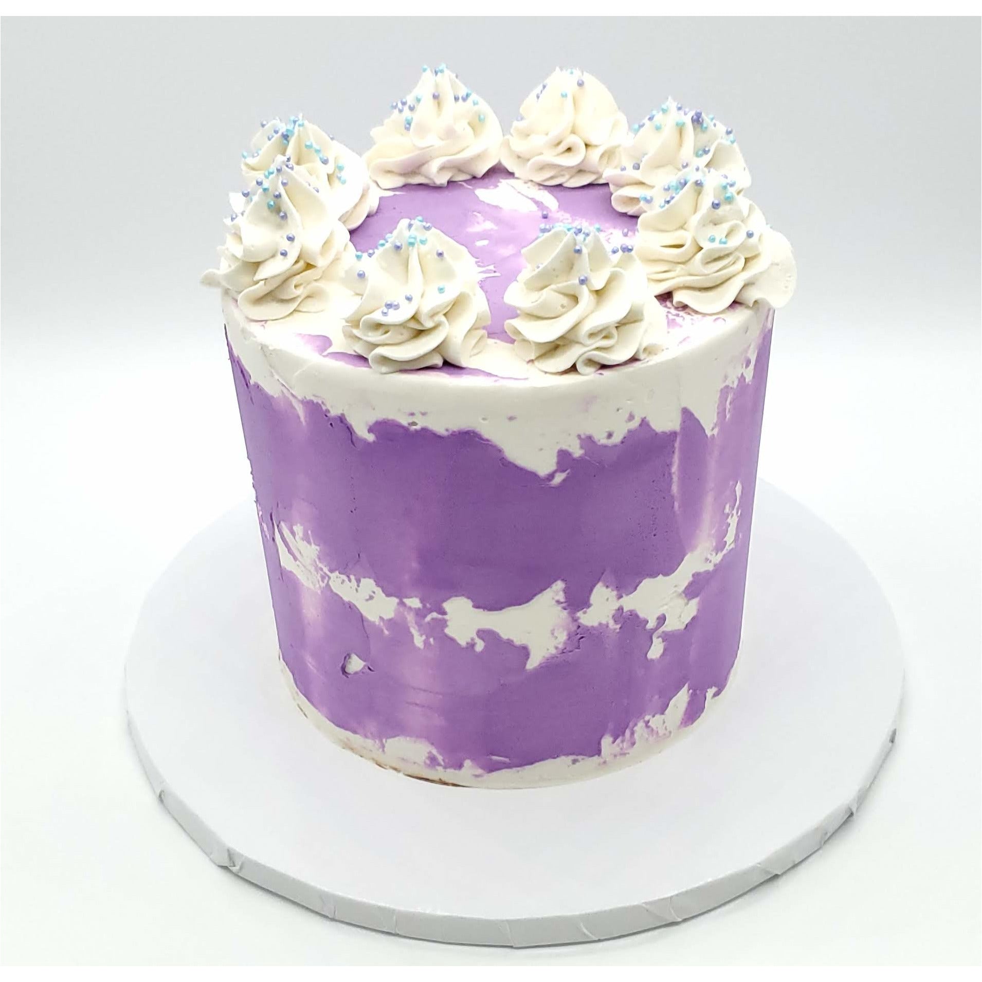 6 Inch Purple Tōn'd Cake with Frosting and Sprinkles on top